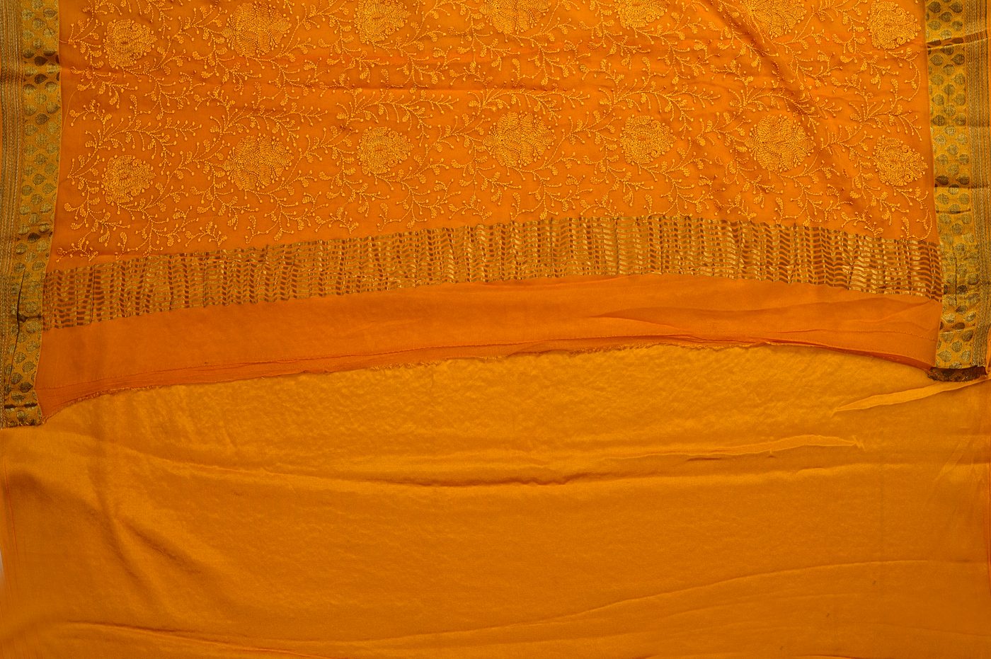 Crepe Bandhani № 01. fine hand tied bandhej dots on flowing silk crepe, natural dye palette. Photographed at Trisha Silks Jubilee Hills.