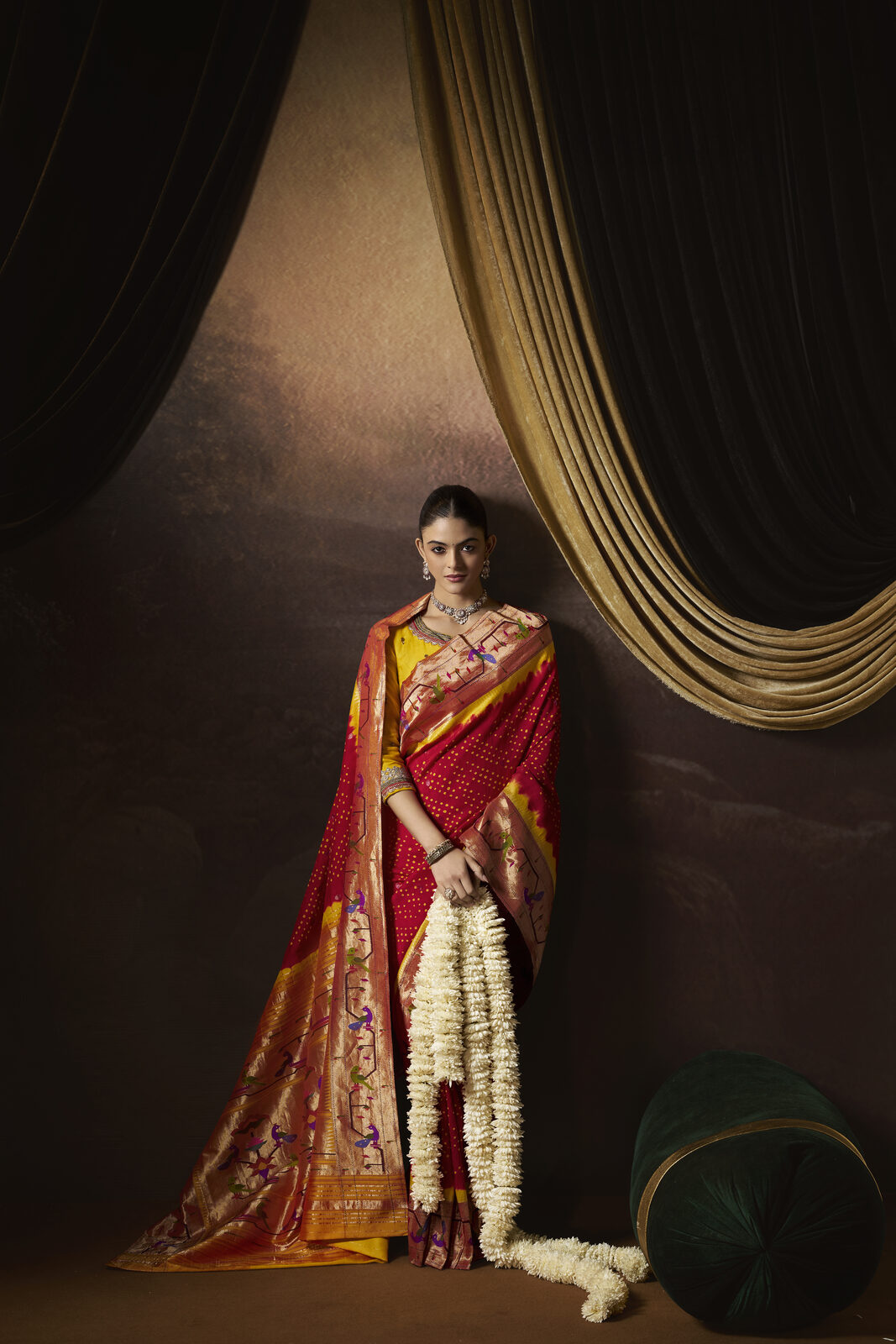 Trisha Silks bride in a red and gold paithani-borderered bridal saree from the trousseau collection
