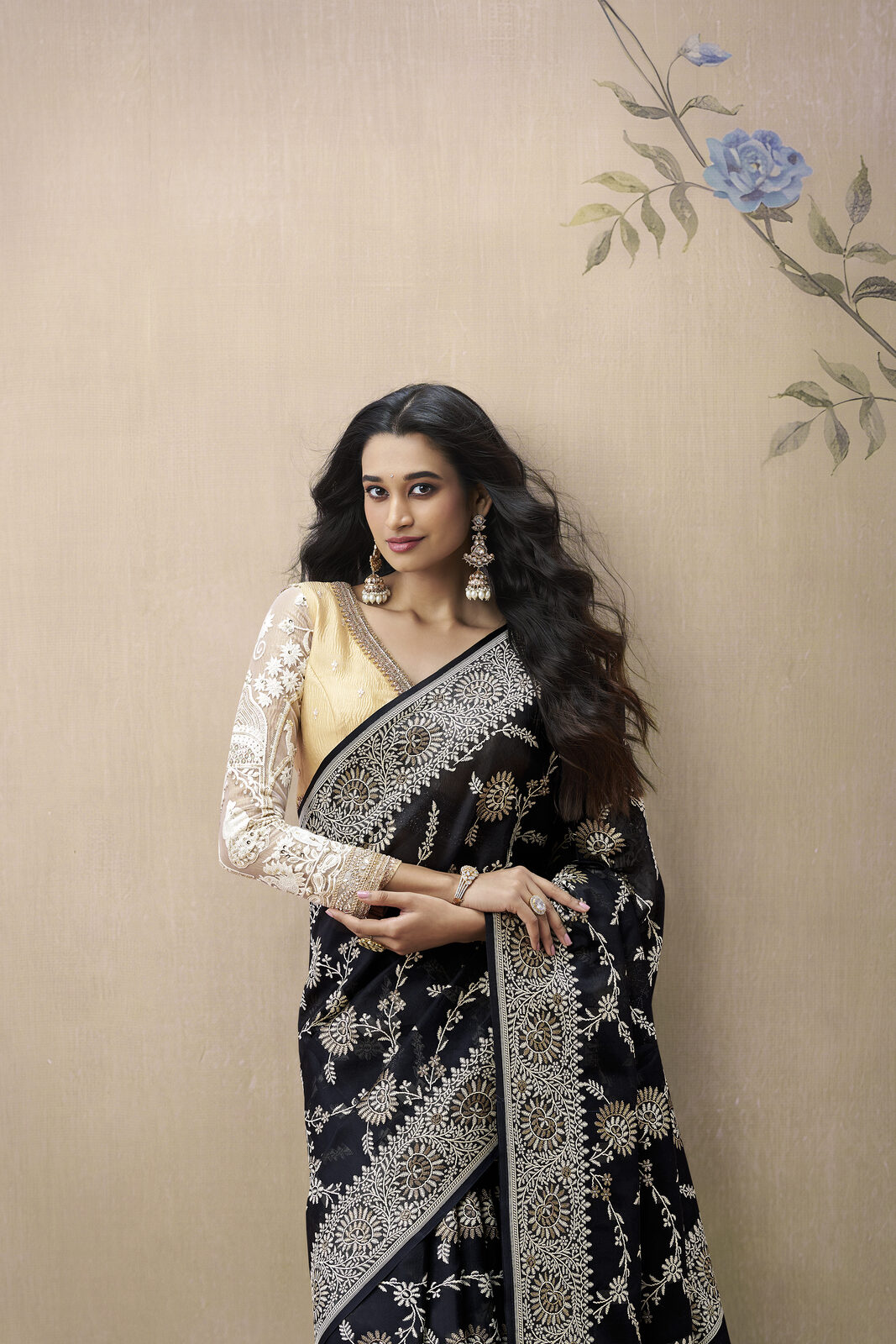 Editorial portrait of a daughter wearing her mother's restyled heirloom Banarasi saree