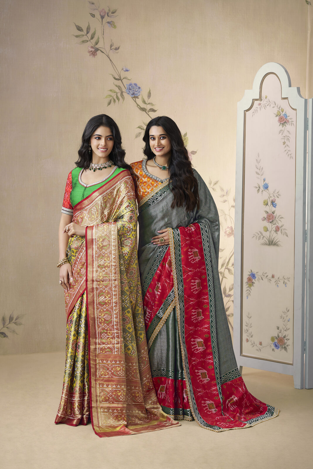 Editorial portrait of a patron in a sheer organza silk saree with gold zari border