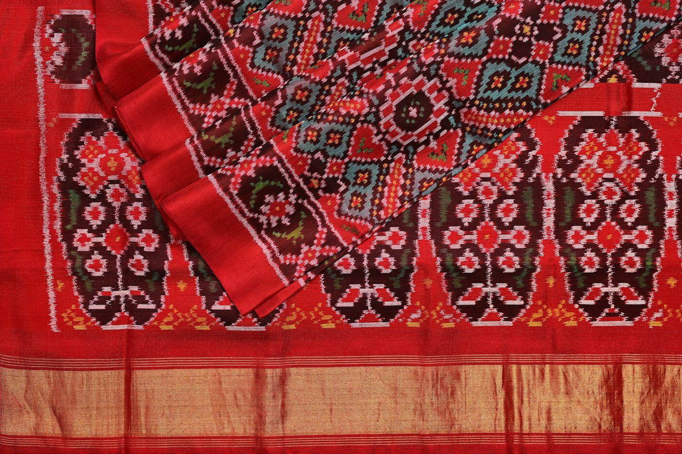 Patan Patola № 01. double ikat by the Salvi family, vegetable dyed silk, six month weave. Photographed at Trisha Silks Jubilee Hills.